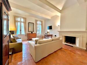 Appartements Le 100% Uzes, charme en plein centre historique : photos des chambres