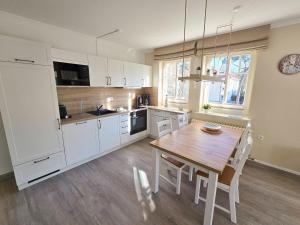 Dünenpark Binz - Komfortplus Ferienwohnung mit 1 Schlafzimmer und Balkon im Obergeschoss 302