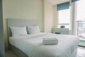 Cozy Stay Studio Apartment at Elpis Residence By Travelio