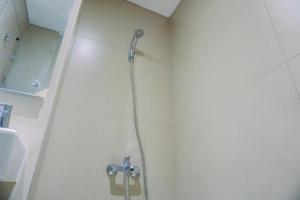 Cozy Stay Studio Apartment at Elpis Residence By Travelio