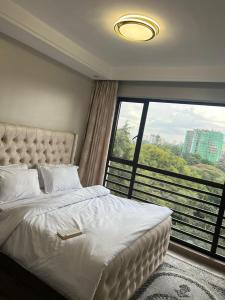 smart elegant three bedroom apartment with swimming pool fully equipped gym child play area proximity to shopping malls and great breathtaking views