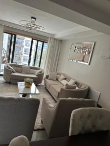 smart elegant three bedroom apartment with swimming pool fully equipped gym child play area proximity to shopping malls and great breathtaking views