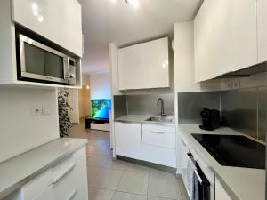 Appartements T2 cosy avec parking - Goupama Stadium LDLC Arena : photos des chambres