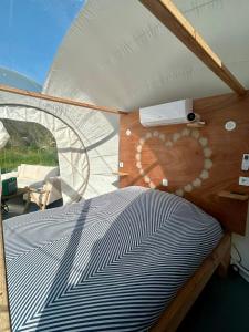 Tentes de luxe Les bulles Nimoises : photos des chambres
