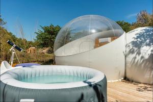 Tentes de luxe Les bulles Nimoises : photos des chambres