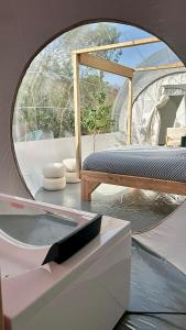 Tentes de luxe Les bulles Nimoises : photos des chambres