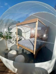 Tentes de luxe Les bulles Nimoises : photos des chambres