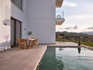 Akra Villa, a Cliffside Escape with Pure SeaViews, By ThinkVilla