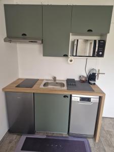 Appartements Appartement des Aubepines : photos des chambres