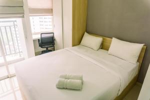 Studio Room with Cozy Style at Serpong Garden Apartment By Travelio