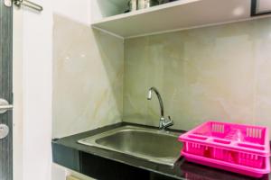 Studio Room with Cozy Style at Serpong Garden Apartment By Travelio