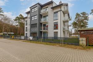 Stylish Apartment Rybacka with Parking by Noclegi Renters