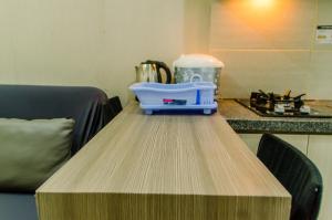 Comfort and Simply 2BR at Green Pramuka City Apartment By Travelio