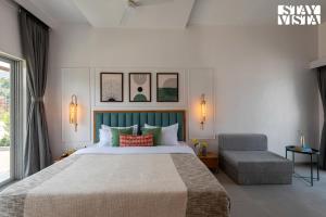 StayVista at The Grand Ten with lawn and pool