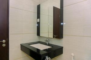 Fancy and Nice 1BR at Brooklyn Alam Sutera Apartment By Travelio