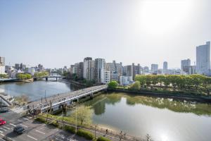 LIT広島駅前 広島駅から徒歩5分 全室リバービューでベッドはairweaveを採用 Spacious rooms with river viewsto yourself Supported