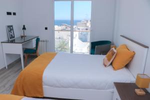 Duplex terrasse vue mer et ville, Pieds dans leau