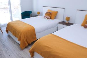 Duplex terrasse vue mer et ville, Pieds dans leau