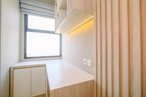Homey and Modern Look 2BR Transpark Cibubur Apartment By Travelio