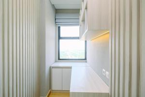 Homey and Modern Look 2BR Transpark Cibubur Apartment By Travelio