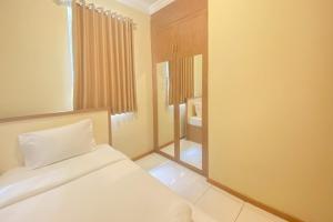 Nice and Homey 2BR at Grand Palace Kemayoran Apartment By Travelio