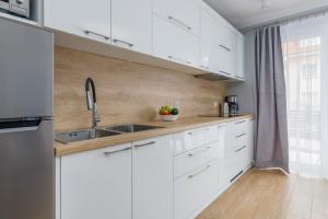 Seaside Apartment Rybacka with Parking by Noclegi Renters