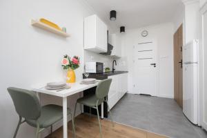 Cosy Studios in the Centre of Warsaw by Noclegi Renters