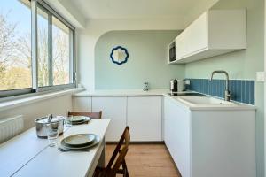 Appartements Le Nid - Les Demeures d-Adrien : photos des chambres