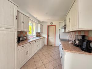 Maisons de vacances Saint Ho Mer Maison lumineuse vue mer 8 pers 4 chambres 2 sdb 2 WC etage renove en 2025 belle terrasse grand jardin clos parking 8 mn a pied petite plage grand jardin pres de Port en Bessin, Bayeux et plage Omaha beach : photos des chambres