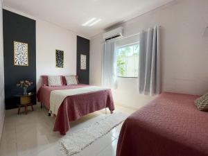 Casa Privativa de 3 Quartos com Piscina com Aquecimento Solar a 800m das Praias de Taperapuan, Ar Condicionado, WiFi 110Mbps, Churrasqueira, Garagem para 02 Carros