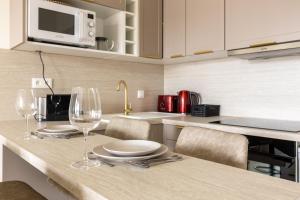 Appartements Le 72 contemporain - les Arenes : photos des chambres