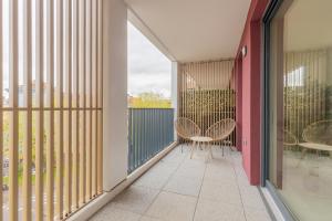 Appartements Le 72 contemporain - les Arenes : photos des chambres