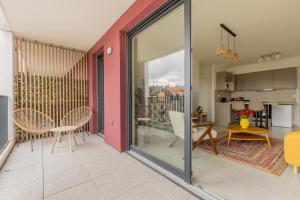Appartements Le 72 contemporain - les Arenes : photos des chambres