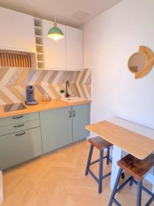 B&B / Chambres d'hotes L'Escale Appartements et Suites en bord de Mer : photos des chambres