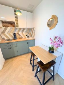 B&B / Chambres d'hotes L'Escale Appartements et Suites en bord de Mer : photos des chambres