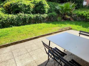 Appartements T4 90 m2, Terrasse et jardin prive 100m2 : photos des chambres