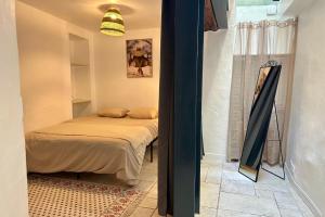 Appartements Au fil de l’eau A cozy nest in the heart of the city : photos des chambres