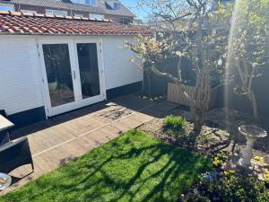 Wanderlust - Vlakbij strand - Omheinde privétuin