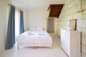 Villas Narcisse Bienvenue - Elegance et Raffinement : photos des chambres