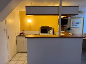 Appartements Studio Soleil : photos des chambres