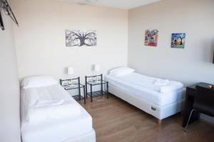 Double or Twin Room with Shared Bathroom room in Lyngás Guesthouse