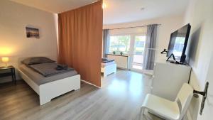 Modern 3-Room Apartment with Balcony & Free Parking & Free Wi-Fi in Hagen - HL01