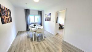 Moderne Monteurwohnung mit Balkon, Einzelbetten, voll ausgestattet, kostenloser Parkplatz & WLAN in Hagen - HL01