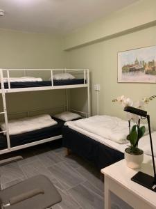 Basic Triple Room with Shared Bathroom room in Hostel Bed & Breakfast