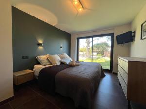 Maisons de vacances Les Tamaris - Grande Maison de Plage - Jacuzzi : photos des chambres