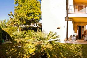 R03 - Trilocale con giardino