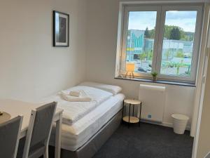 Modernes Studio mit Holzflair in Zentrumsnähe