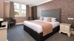 Superior double / triple  room in Sunbank House Metro Hotel