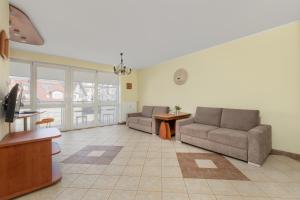 Jasny i Delikatny Apartament Sun Seasons 24 w Kołobrzegu by Noclegi Renters
