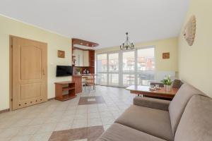 Jasny i Delikatny Apartament Sun Seasons 24 w Kołobrzegu by Noclegi Renters
